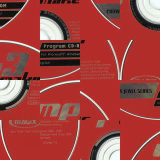 A red Magix MP3 Maker CD cut into sixteen equal squares and randomly rearranged.